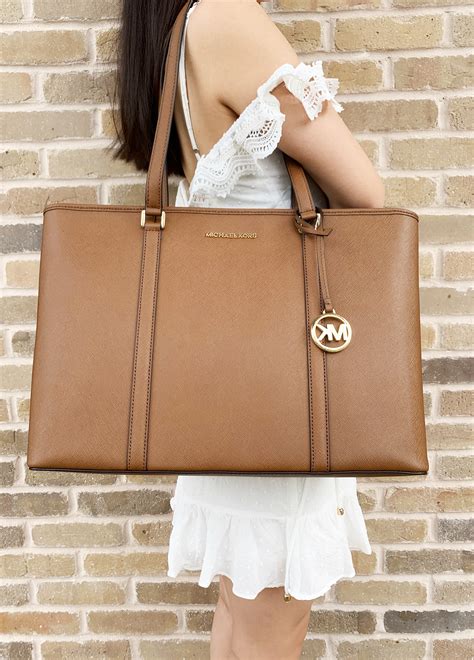 michael kors laptop bag apple|michael kors sady laptop bag.